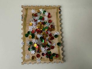 Ozdoba choinkowa w kształcie znaczka pocztowego